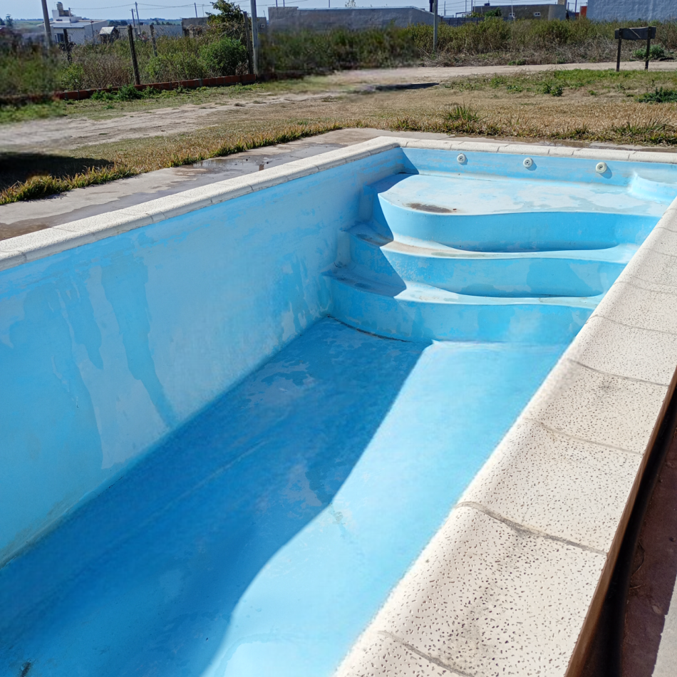 CASA CON QUINCHO Y PILETA